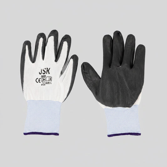 A pair of work gloves shown front and back on a plain white background. The left glove shows the white knitted back with black fingertips and the brand name 'JSK' printed on it, while the right glove shows the black-painted palm side with a light blue and white checkered wrist cuff.